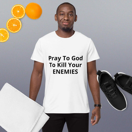 A man wearing a white crew neck t-shirt with text on it, standing beside a pair of black sneakers and citrus fruits.