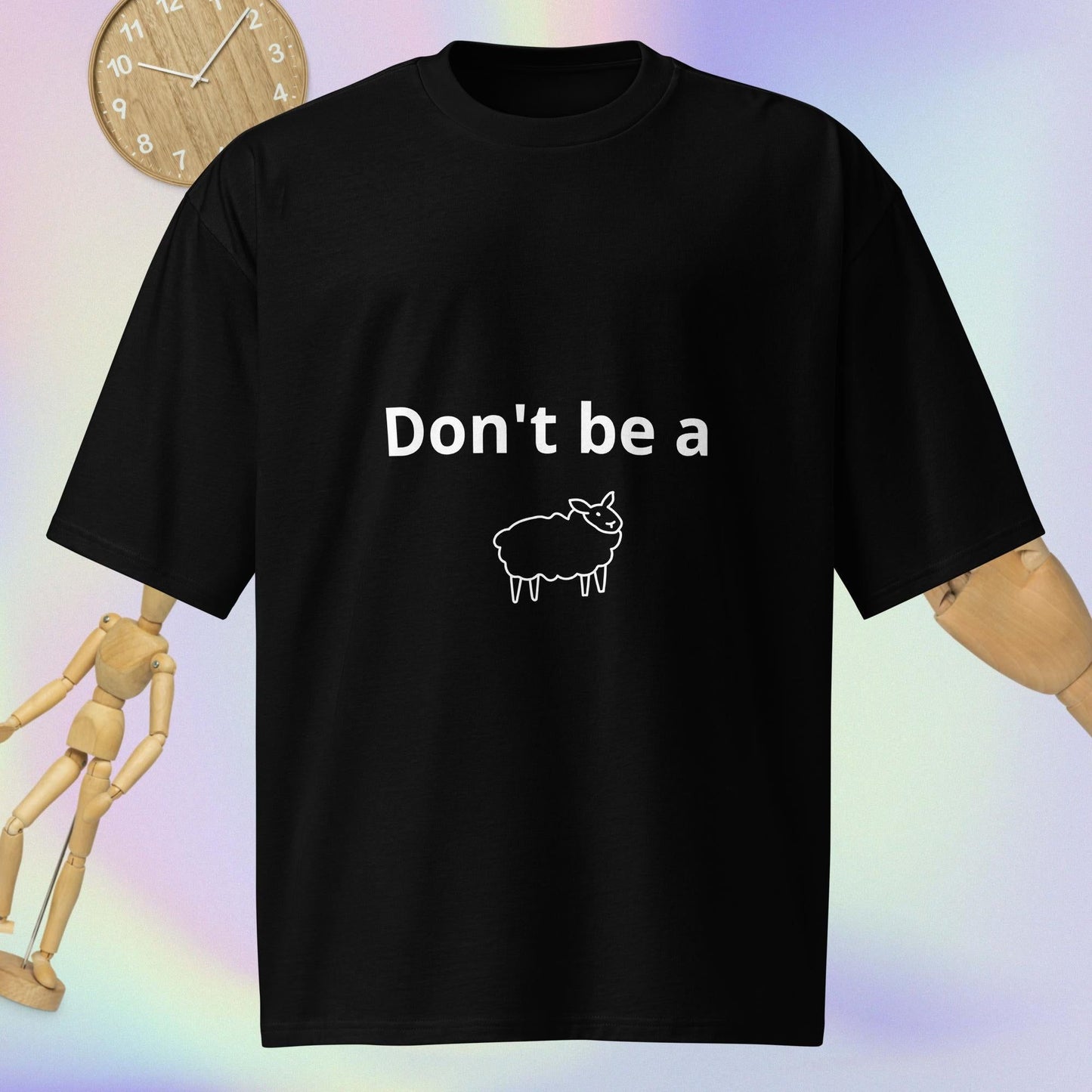 Black oversized heavyweight t-shirt with the phrase 'Don't be a' followed by a sheep graphic printed on the front.