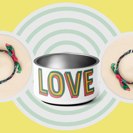 A stainless steel pet bowl with the word 'LOVE' printed on the side, set against a yellow background with a pattern of green concentric circles. The bowl has a double-wall design and anti-slip rubber base.