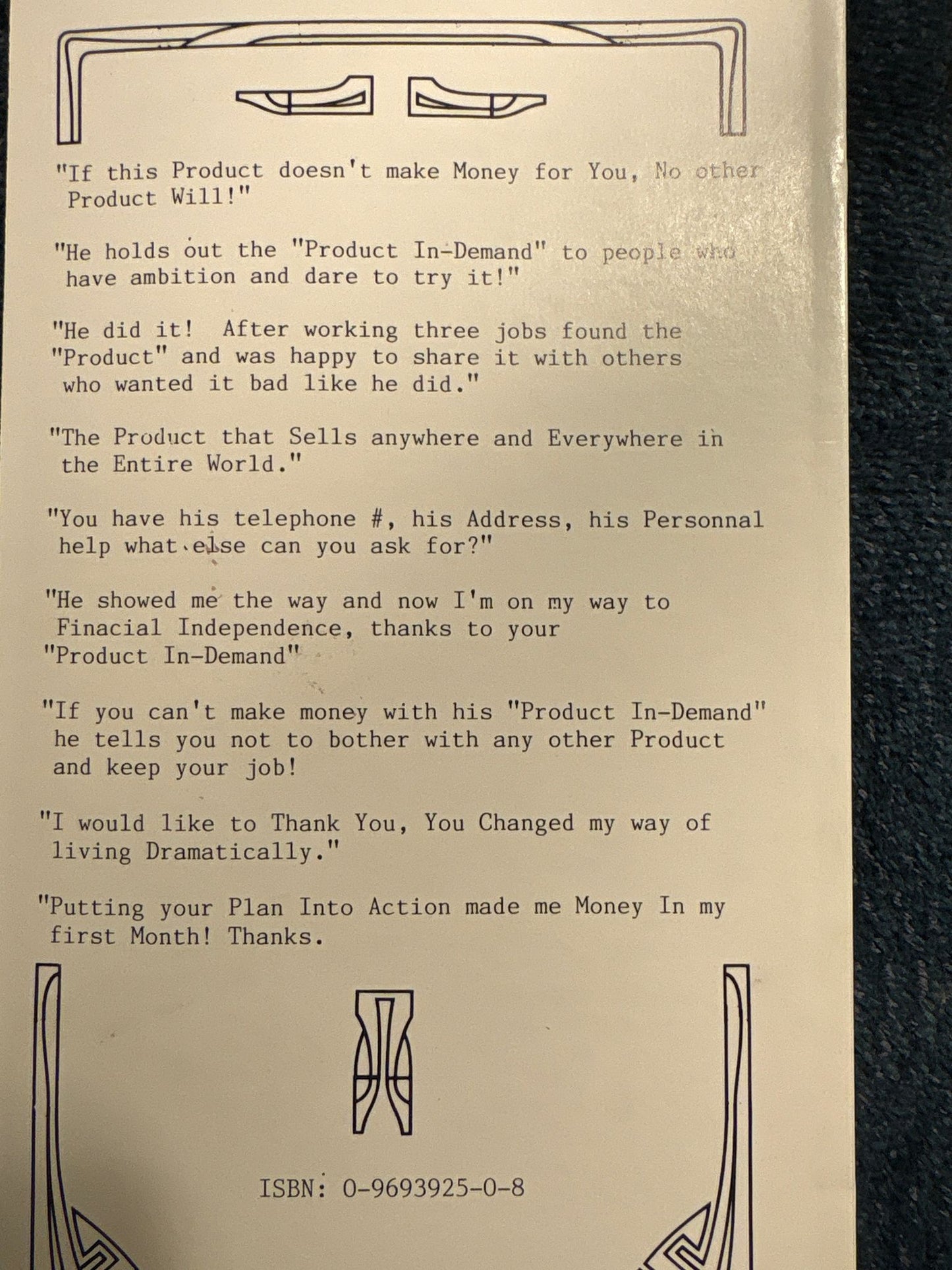 Close-up of a book's back page with text and design elements.