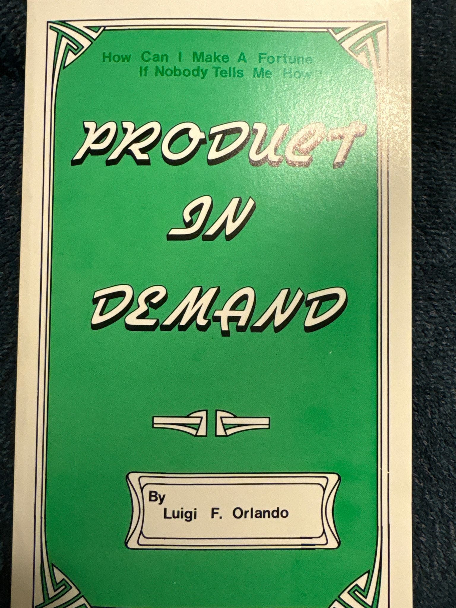 Book cover of 'Product in Demand' by Luigi F. Orlando on a green background